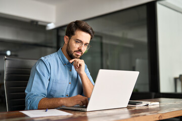 Busy professional business man company employee, young male programmer, latin businessman looking...