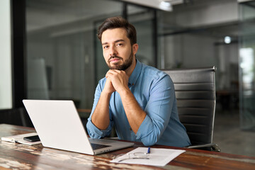 Professional confident young latin businessman, male company manager executive, hispanic...