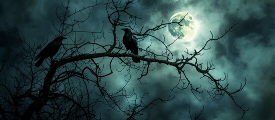 Crows on tree branches with moon shining among thin clouds in dark sky, creating a spooky silhouette.