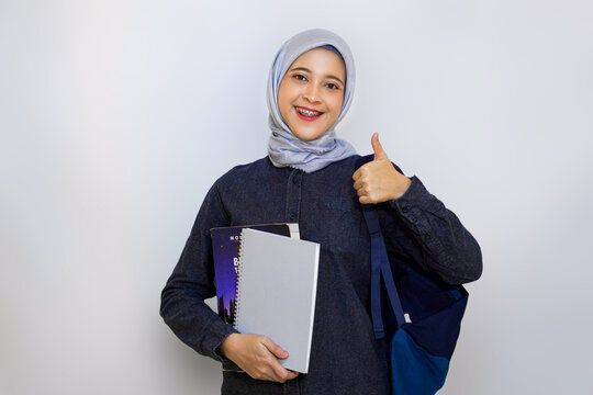 Muslim woman on college student outfit concept.
