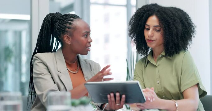 Women, colleagues and tablet conversation at meeting for creative agency or project planning, problem solving or solution. Female people, diversity and teamwork or discussion as research, web or talk