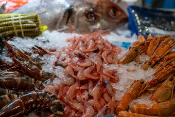 fresh giant prawns, prawns and crayfish on ice