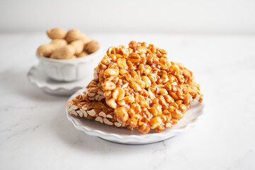 Plate of traditional peanut brittle or palanqueta, mexican candy
