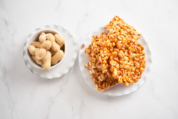 Plate of traditional peanut brittle or palanqueta, mexican candy