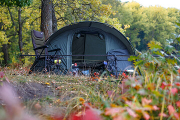 Carpfishing session at the Lake. Fishing in rainy weather, rain.Carp Angling scenic landscape...