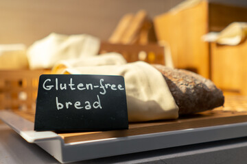 close-up breakfast buffet line serving pastries in the hotel gluten-free bread with signs hospitality