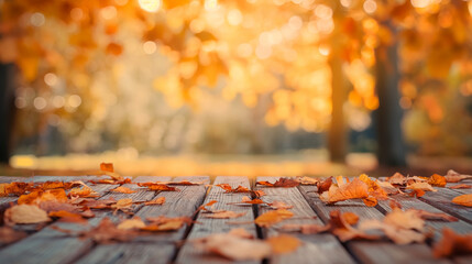 Naklejka na ściany i meble Autumn leaves on the wooden background