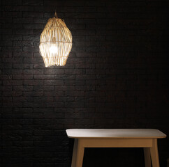 bamboo chandelier lamp in a black room