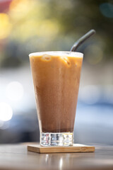 Iced mocha with metal straw