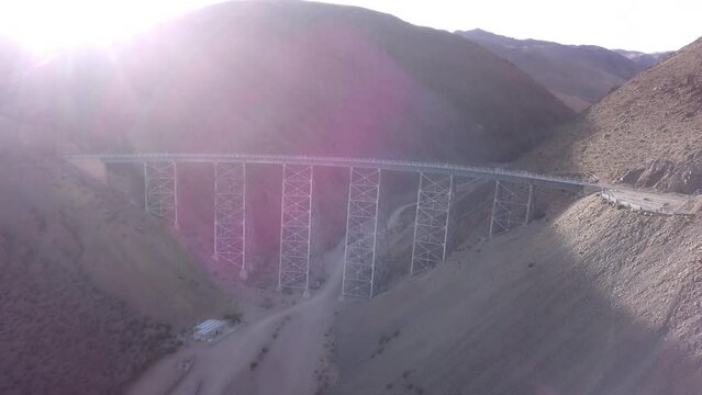 Aerial of Viaducto La Polvorilla, Polvorilla bridge, a popular viaduct of the train to the clouds, a railroad track between Salta and Antofagasta. It is a high level bridge in the Andes Mountains.