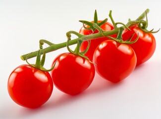 Fresh, ripe tomatoes on the vine, isolated on a white background. Close-up.