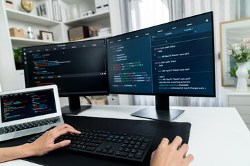 Cropped hands image of IT developer creating with typing information on pc with coding program...
