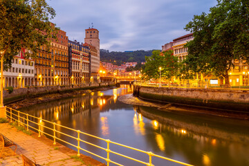 Fototapeta premium Nervion River in Bilbao Spain at Dusk