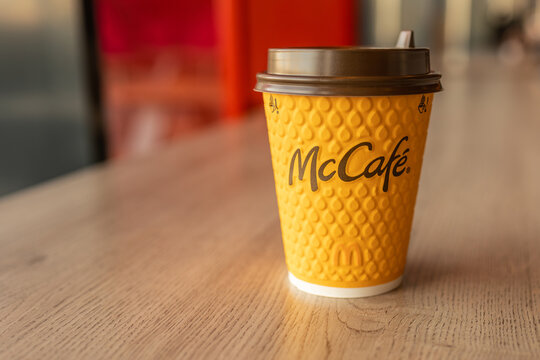 Ukraine, Kyiv - January 31, 2024: McCafe coffee cup on table