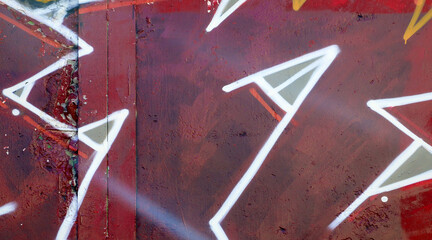 Colorful background of graffiti painting artwork with bright aerosol outlines on wall. Old school...