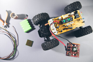 a remote control car with a circuit board and wires