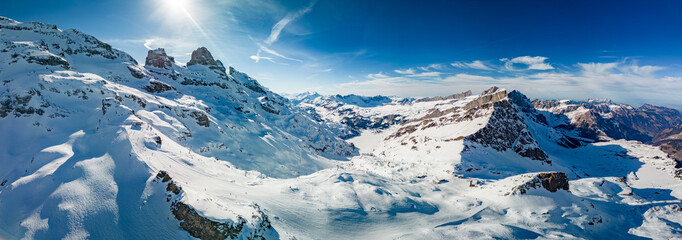 Aerial panoramic winter landscape in Swiss Alps, famous Engelgerg - Titlis ski resort, Switzerland - 726720269