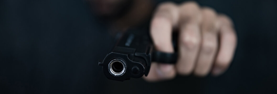 Man hand shooter