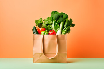 Craft brown shopping paper bag and grocery on blue background. Delivery concept
