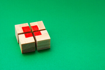 Wooden cube puzzle forming a square in its center