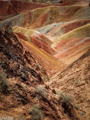 Papier Peint photo Zhangye Danxia Ravine in colorful rock strata in sedimentary rocks - The Rainbow Mountains of China within the Zhangye Danxia Landform Geological Park