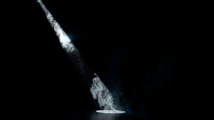 Studio shot of projector haze isolated on black background. White bright ray shining from spotlight...