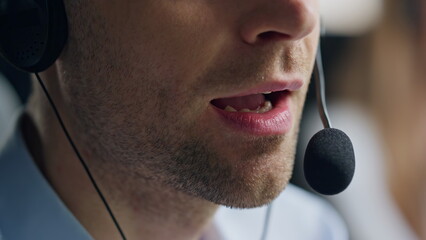 Closeup mouth talking microphone in call center. Sales representative speaking