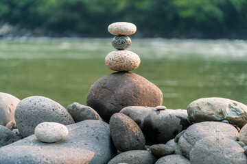 Fototapeta na wymiar Art of stone balancing, meditation and concentration.