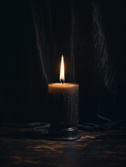 Burning black wax candle in dark magic atmospheric interior, front view candle mockup