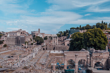 Fototapeta na wymiar Top view of the ruins of Ancient Rome. Ancient Roman Forum from the Capitoline Hill for publication, design, poster, calendar, post, screensaver, wallpaper, cover, website. High quality photo