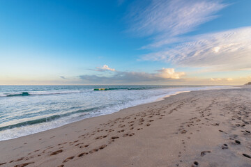 evening light over ocean and beach