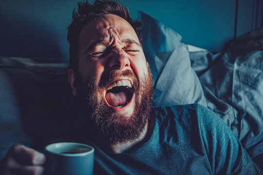 Man waking up needing coffee