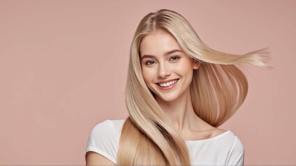Blonde woman smiling for the camera on a pastel background