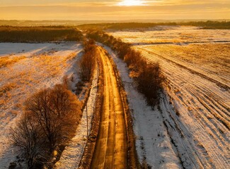 Aerial view of the road at the countryside, at sunset