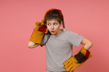 The concept of industrial espionage or eavesdropping neighbors on boys with a construction helmet...