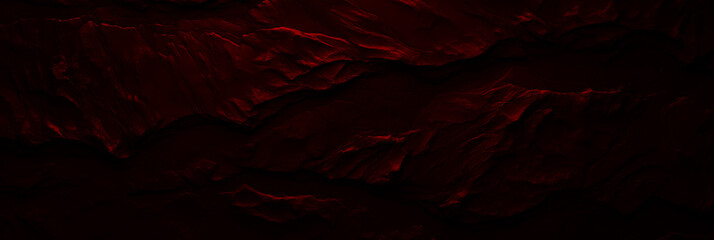 Wide burgundy stone background banner wallpaper design. Dark red rock grunge texture. Mountain surface close-up cracked copy space
