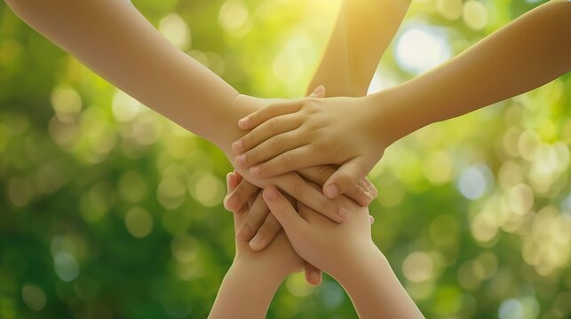 World environment day with global community teamwork, CSR and ESG environmental energy saving collaboration of young children hands stack together on green background for sustainable d : Generative AI