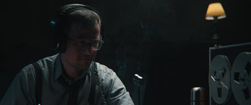 An intelligence officer works at the wiretap station 