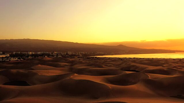 The City of Playa del Ingl&eacute;s at Sunset with the Dunes of Maspalomas in the Foreground