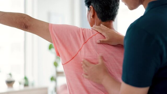 Woman, physiotherapist and shoulder massage in healthcare, appointment or therapy at hospital. Closeup of nurse or chiropractor checking patient muscle for help, examination or clinic consultation
