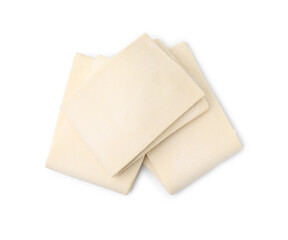 Raw puff pastry dough isolated on white, top view