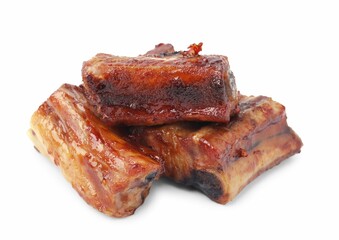 Tasty roasted pork ribs isolated on white