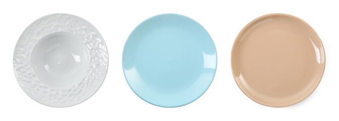 Different clean plates isolated on white, top view