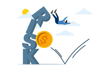 Concept of Risk in investment, volatility and fluctuation of stock market whose price will decrease, businessman falling from a pile of blocks with the impact of the word RISK by coin money, stability