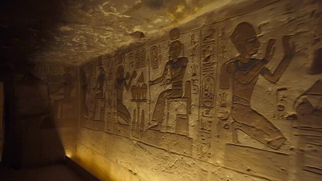 Footage of interior Hieroglyphs in Abu SImbel Egypt. Close shot of some hieroglyphs in a wall of the Abu Simbel temple in Egypt.