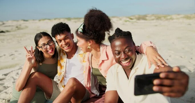 Selfie, excited and group of friends at beach on vacation, adventure or weekend trip together. Peace sign, travel and happy young people by ocean or sea for photography picture on tropical holiday.