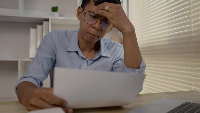 Stressed Businessman, Depressed man Dealing with Financial Setback, Stress and Money Problems, Anxiety and Worry Concept.