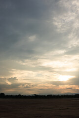 Sky during overcast, storm at evening. Include many gray clouds, empty space, light nature, sunset sunrise, horizon skyline, land or landscape at outdoor for background. Concept of disaster, danger.