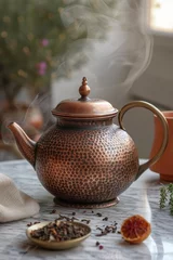 Foto op Aluminium A beautiful teapot stands on the table in the interior. Making tea © Александр Лобач