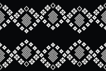 Traditional ethnic motifs ikat geometric fabric pattern cross stitch.Ikat embroidery Ethnic oriental Pixel black background.Abstract,vector,illustration. Texture,scarf,decoration,wallpaper.